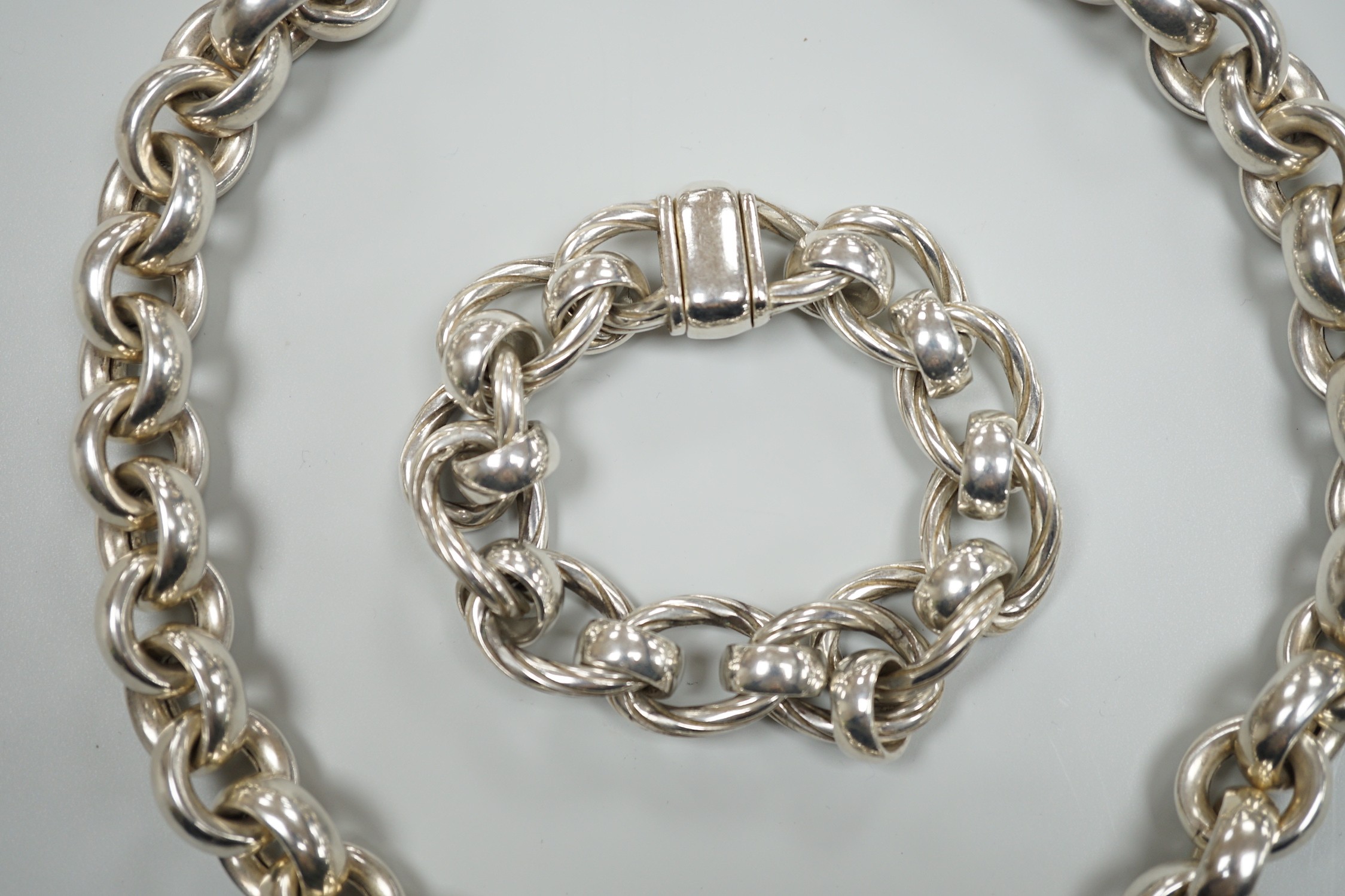 An Italian 925 'Old Florence' chain link bracelet, 20cm and a 925 chain link necklace, 48cm, gross weight 9.2oz.